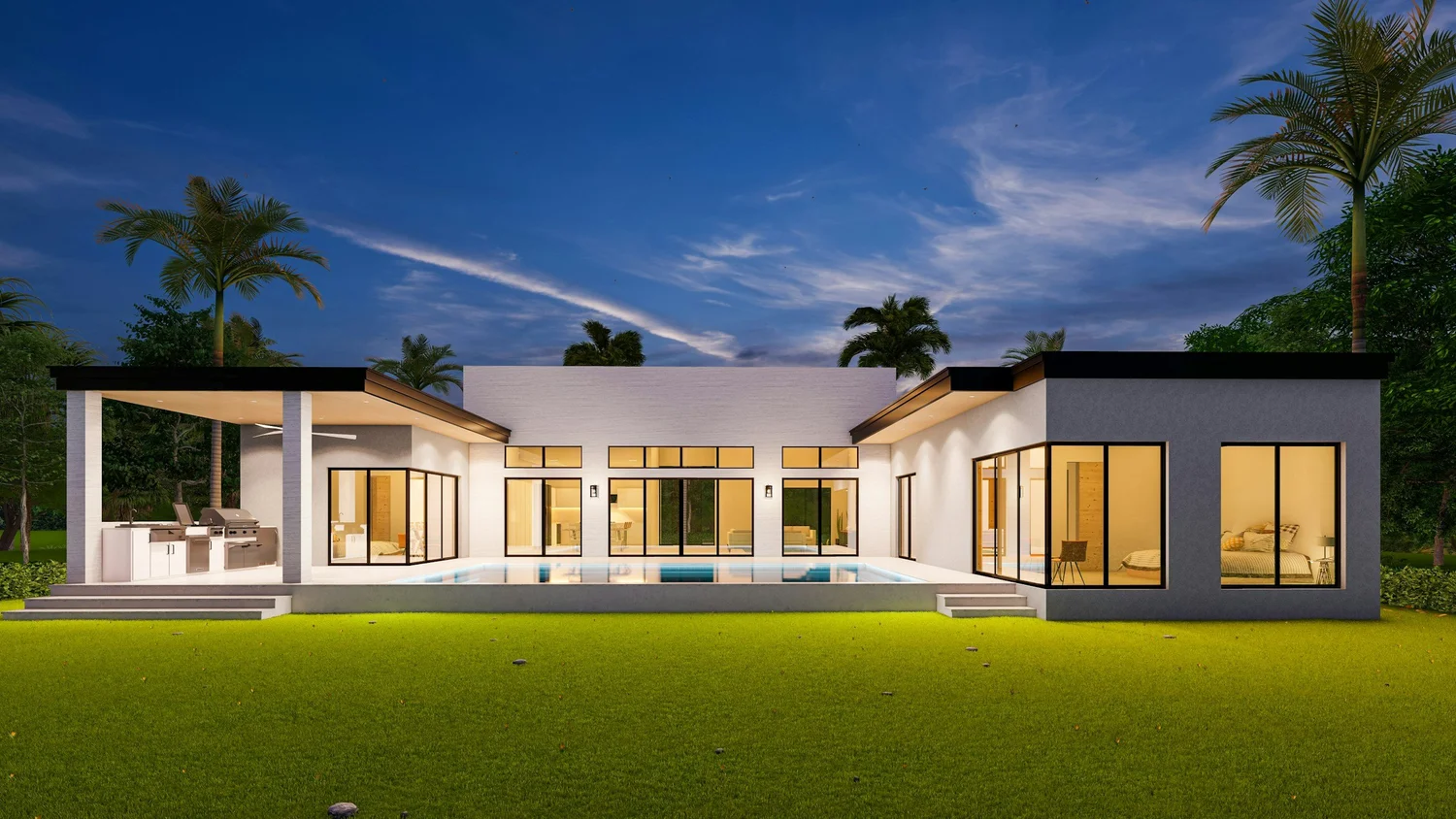 Modern house with large windows and outdoor kitchen at night, surrounded by palm trees and a landscaped lawn.